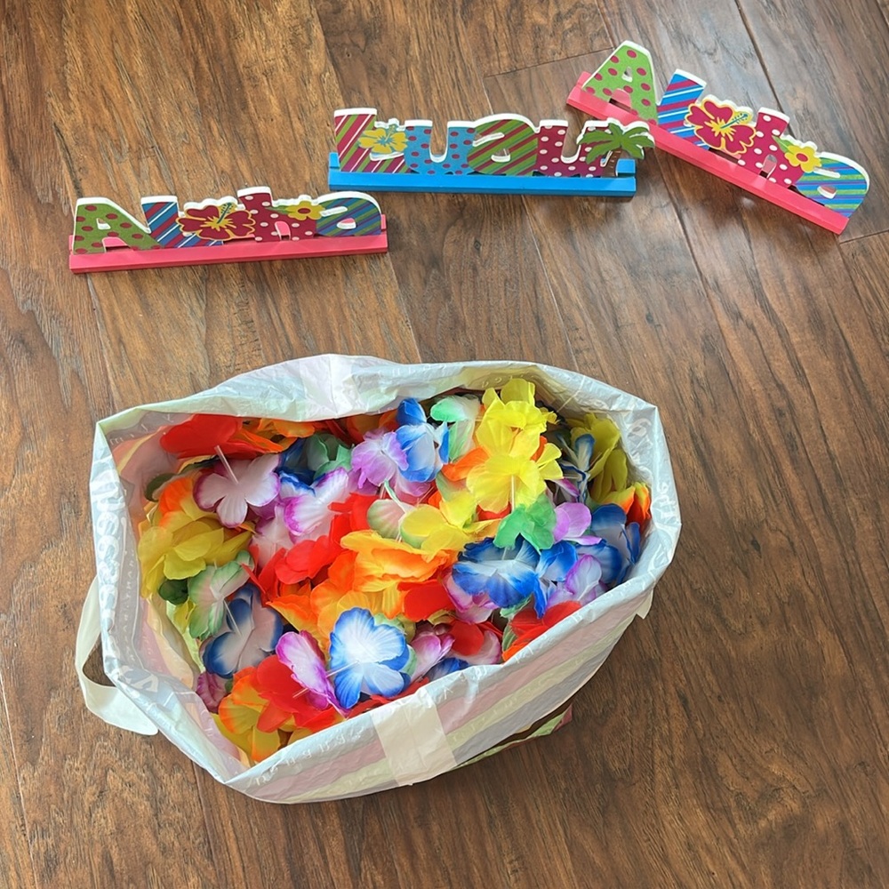 Planning a luau? 3 Tabletop signs: Aloha, Luau + bag of silk leis